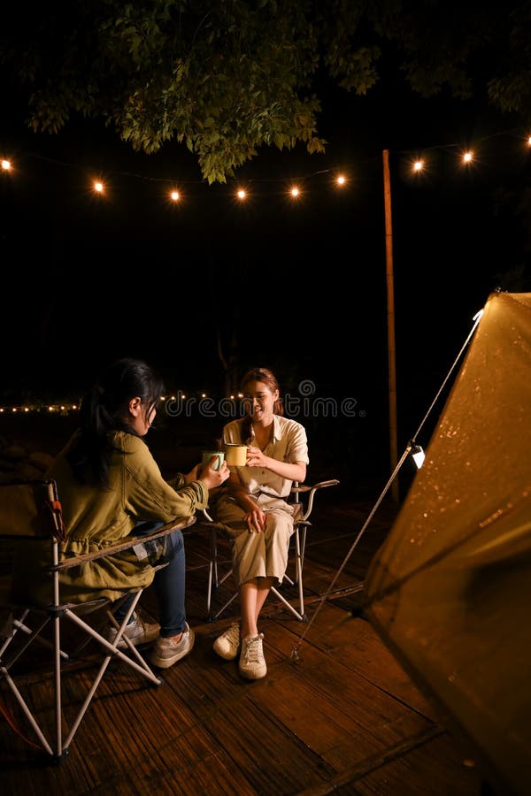 https://thumbs.dreamstime.com/b/two-asian-female-best-friends-talking-sipping-hot-coffee-enjoy-camping-together-night-two-millennial-asian-female-best-252288897.jpg