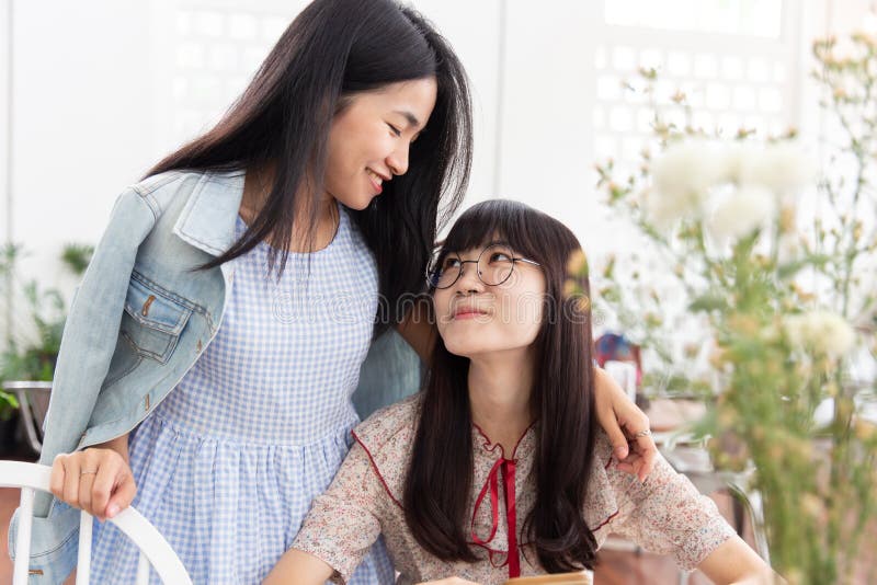 Japanese Schoolgirl Lesbians - Two Asian Girl Teen Love Together Looking Together and Smile Stock Image -  Image of friend, finger: 123617059