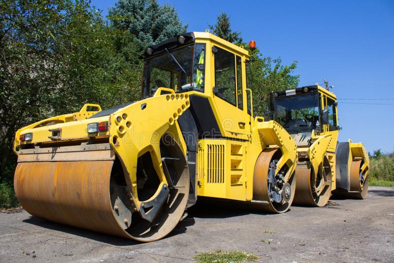 Two asphalt rollers stock image. Image of asphalt, pressure 103004463