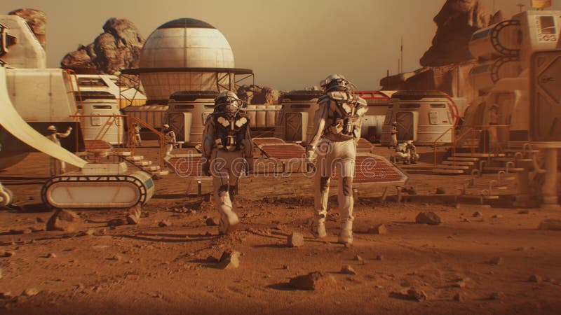 Two astronauts walk toward research station on Mars stock image