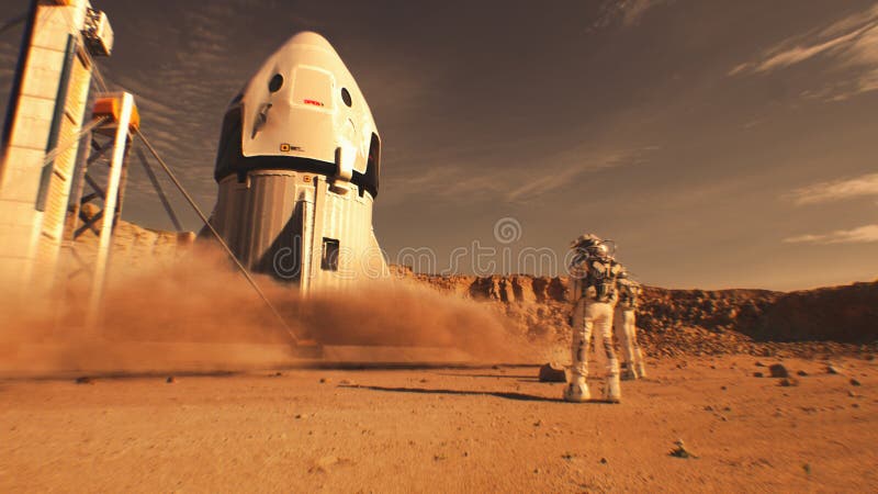 Two astronauts watch spacecraft landing on Mars surface. Two astronauts in spacesuits stand, watch spacecraft landing on Mars surface. Manned space mission on red planet. Technological advance of the future. Futuristic colonization and exploration concept.