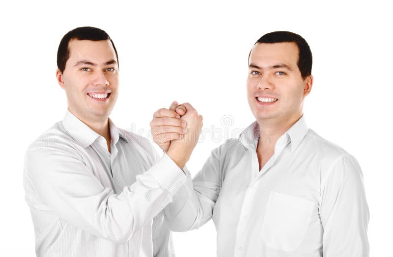 Two attractive positive smile young men twins isolated