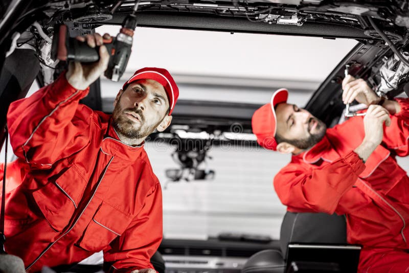 Car Service Workers Disassembling Car Interior Stock Image Image of