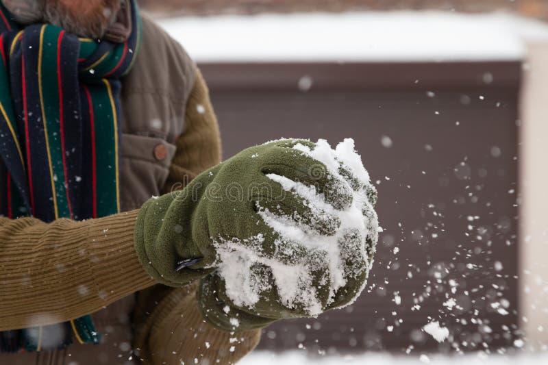 Two balls of snow lie on marble tile stock photography