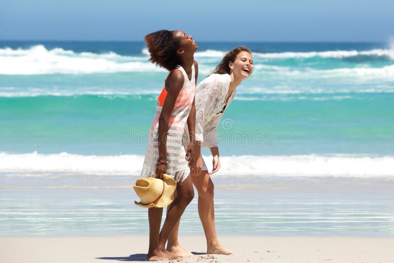 Two Barefoot Friends Enjoying the Beach Lifestyle Stock Photo - Image ...