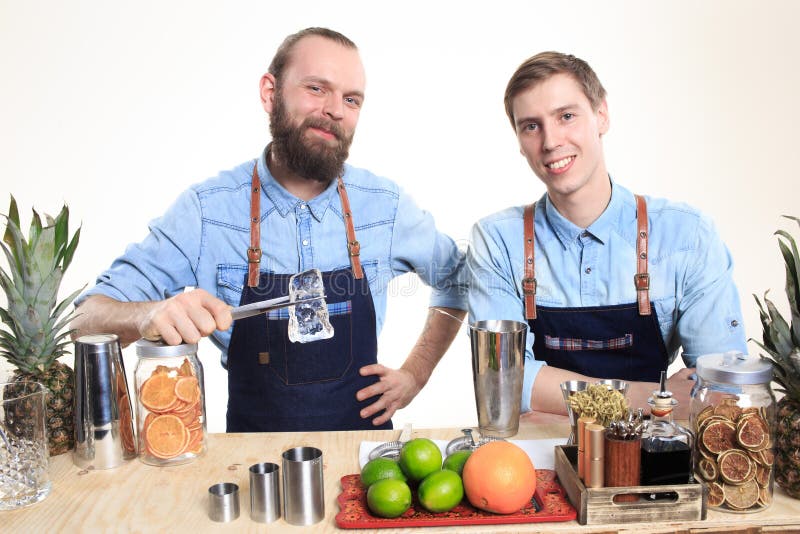 Two Bartender with a Shaker and Bottle on White Stock Image Image of
