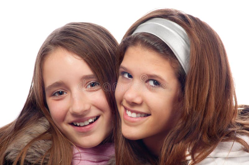 Two beautiful teenage girls smiling