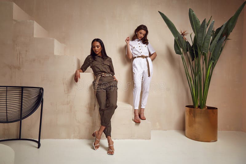 Two Beautiful Woman Fashion Model Brunette Hair Friends Wear Overalls Suit Casual Style Sandals High Heels Accessory Clothes Stock Image - Image of female, fashion: 177166975 Two Beautiful Woman Fashion Model Brunette Hair Friends Wear Overalls Suit Casual Style Sandals High Heels Accessory Clothes Stock Image - Image of female, fashion: 177166975