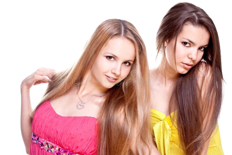 Two beautiful women in a colored dress