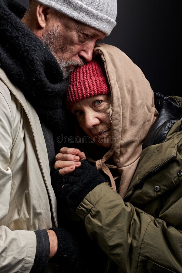 two-beggars-homeless-people-support-each-other-two-beggars-homeless-people-support-each-other-try-to-warm-up-dirty-wear-hugging-207977321.jpg?profile=RESIZE_400x