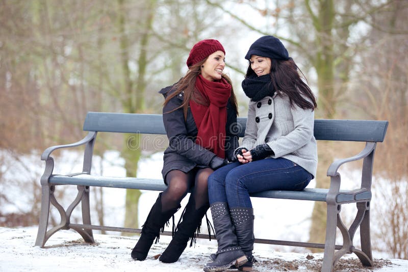 Two Bestfriends Sitting on a Park Bench