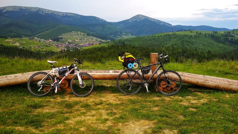 Two bicycles on the background of the Carpathian Mountains somewhere royalty free stock photo Two bicycles on the background of the Carpathian Mountains somewhere royalty free stock photo