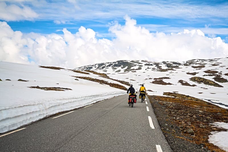 Two bikers in high mountains, Norway