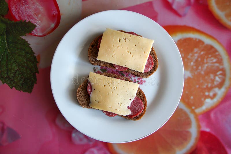 Two Black Bread Sandwiches with Salami and Cheese, Top View Stock Image
