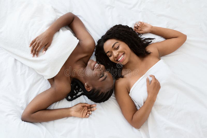 800px x 533px - Two Black Young Women Covered in Towels Laying on Bed Stock Photo - Image  of leisure, naked: 204805956