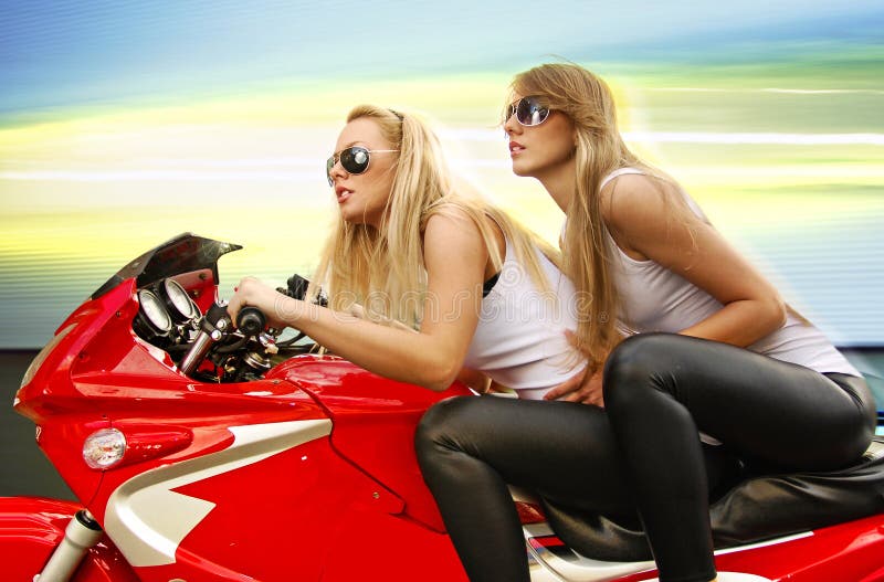 Two blonde on a motorcycle