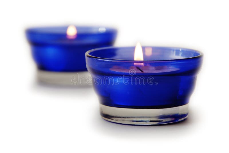 Two blue candles isolated