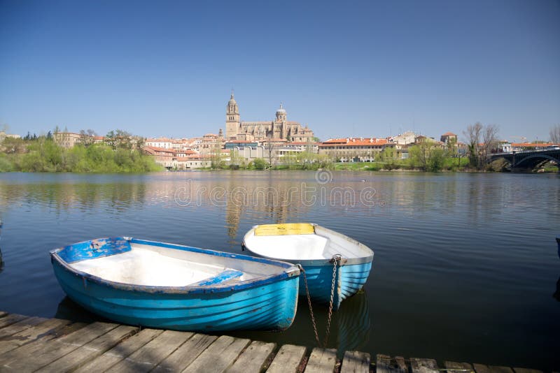 Two boats next in front of Salamanca