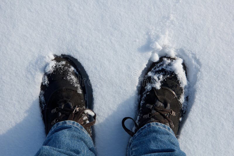 Two boots in snow stock photo. Image of footstep, walking - 112071512