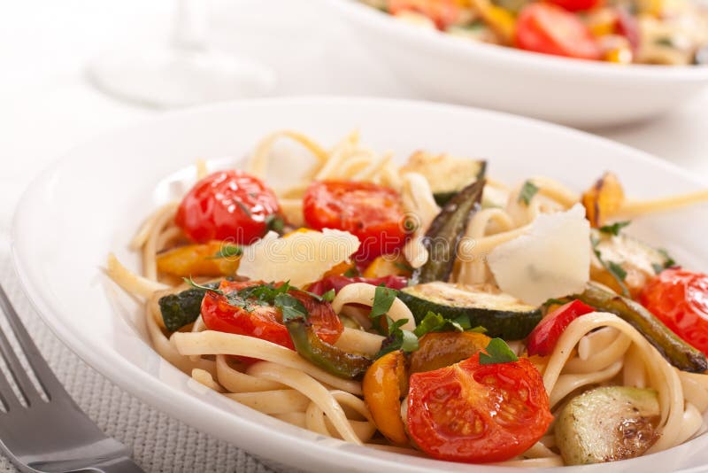 Two bowls of Mediterranean pasta