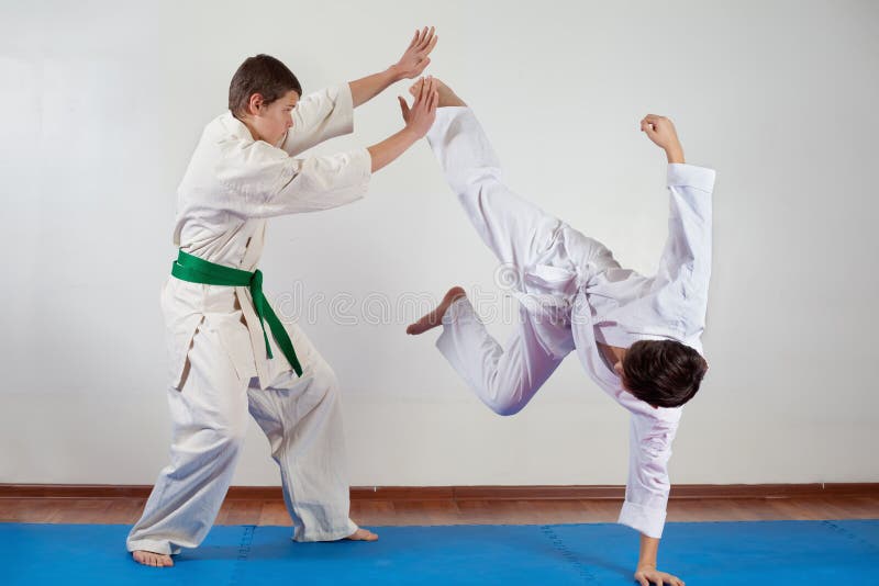 Two Boys Demonstrate Martial Arts Working Together Stock Image Image of defense, kombat 93310461
