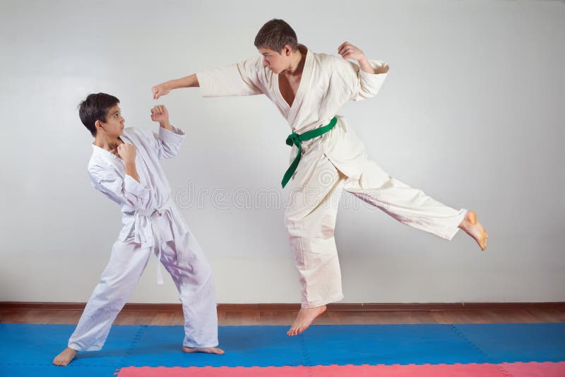 Two Boys Demonstrate Martial Arts Working Together Stock Photo Image