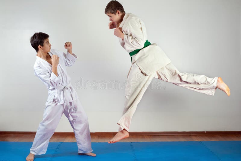 Two Boys Demonstrate Martial Arts Working Together Stock Photo Image