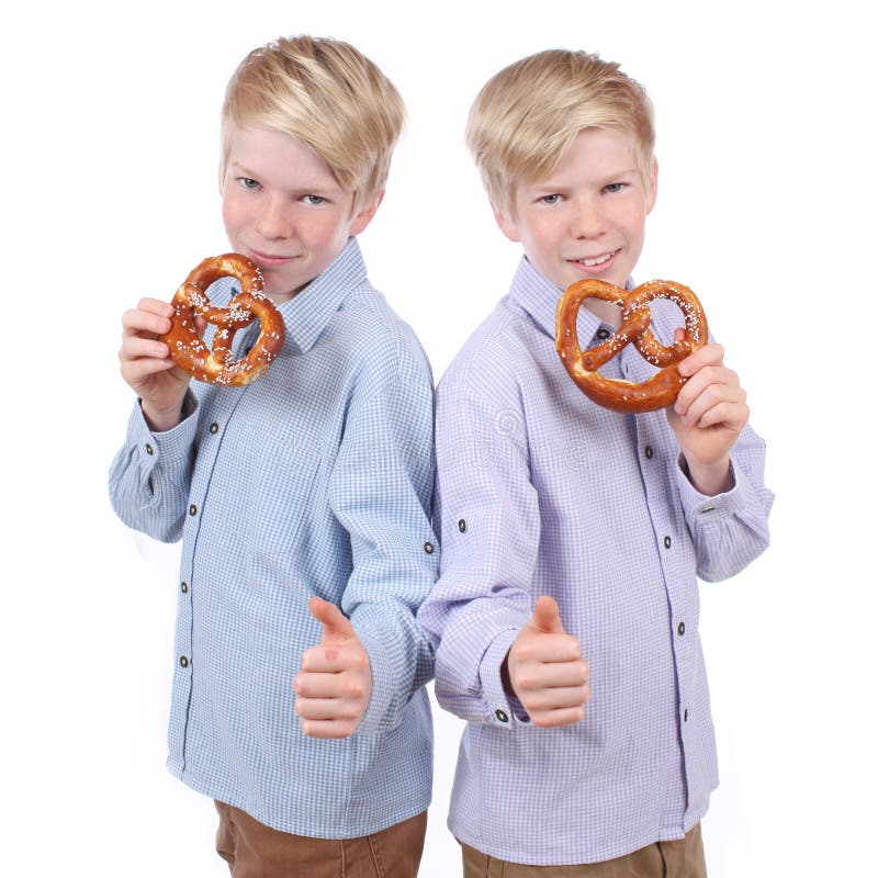 Two Boys Eating Pretzels Stock Photos Free & RoyaltyFree Stock