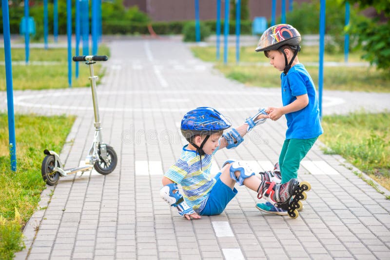 Boy fall on roller skates stock photo. Image of nature - 19204564