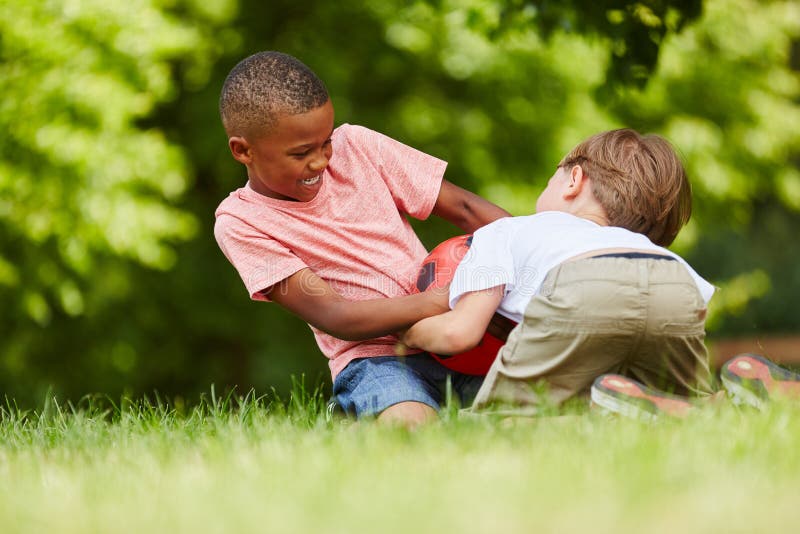 Two Boys Play Soccer Together Stock Image - Image of kids, happy: 111620341