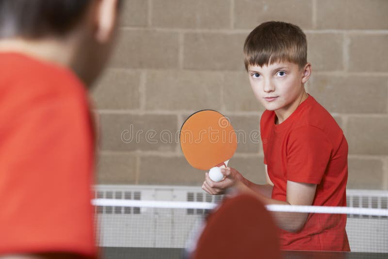 Two Boys Playing Table Tennis Match in School Gym Stock Image Image