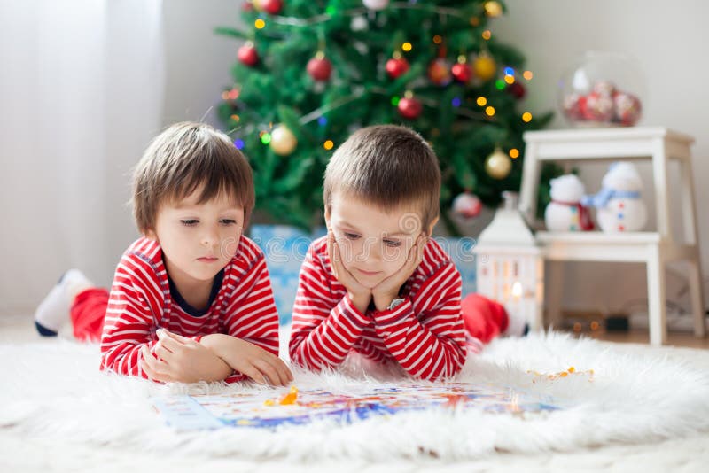 two-boys-reading-book-front-christmas-tree-stock-photos-free