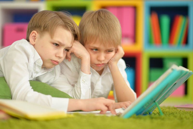 Two boys reading