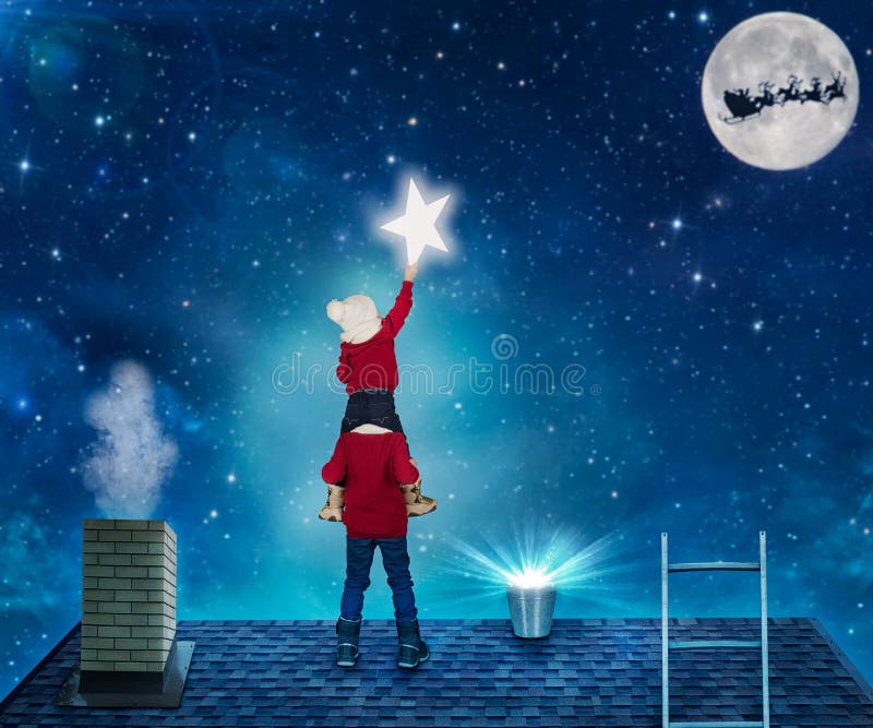 Merry Christmas .Two brothers in Christmas night standing on the roof of the house and collect the stars from the sky in a bucket. Merry Christmas .Two brothers in Christmas night standing on the roof of the house and collect the stars from the sky in a bucket.
