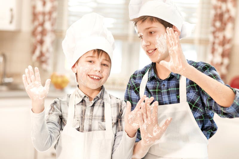 Two brothers in cook hats. stock image. Image of love 87239037