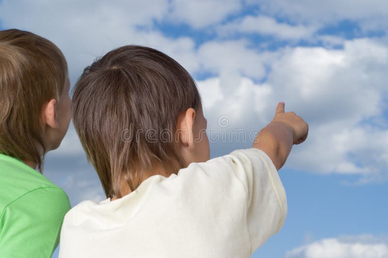 Two brothers look to the sky