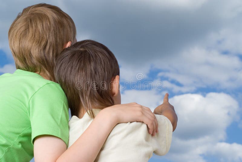 Two brothers look to the sky