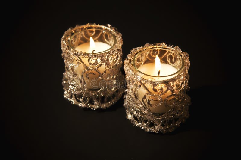 Two Burning Candles In Glass Candlesticks Stock Photo Image of