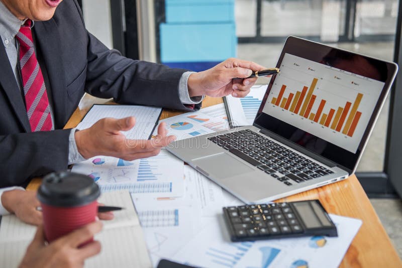 Two business team discussing and planning strategy company growth project success financial statistics, Partner meeting royalty free stock photos