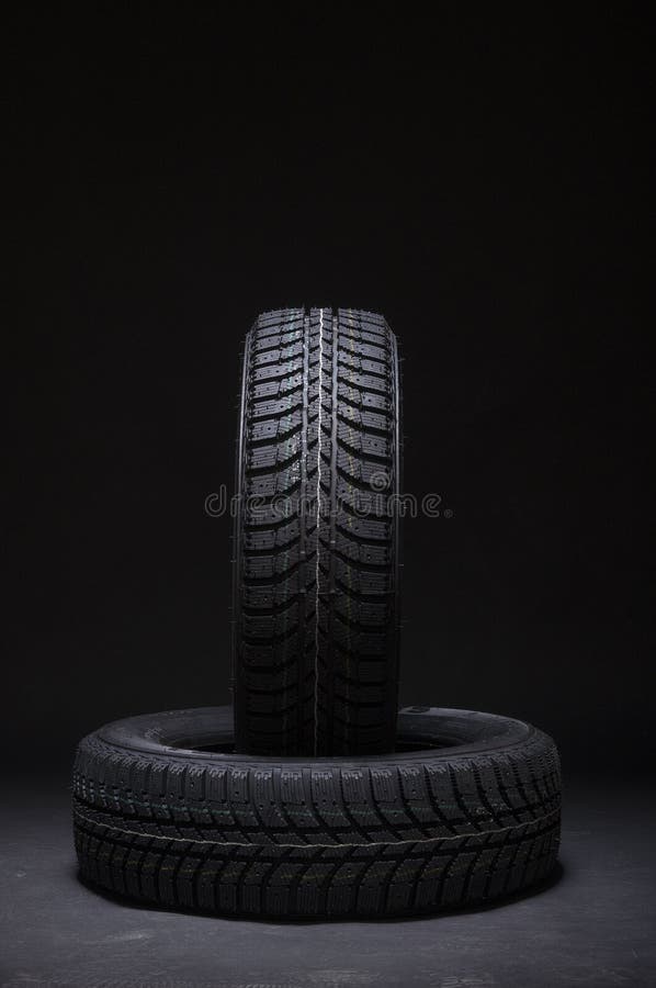 Two car tires with winter print