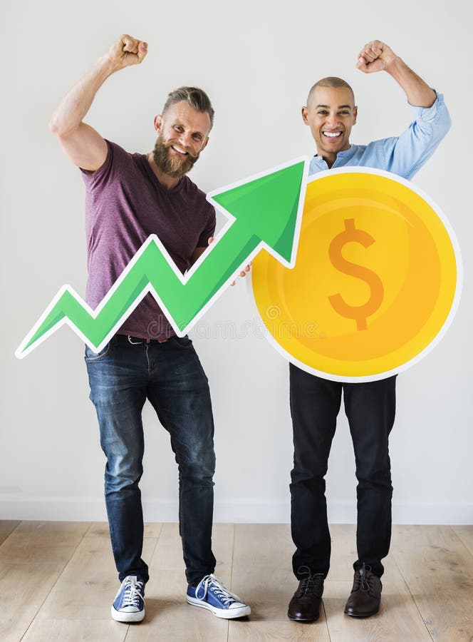 Two casual man holding business icon royalty free stock photo Two casual man holding business icon royalty free stock photo