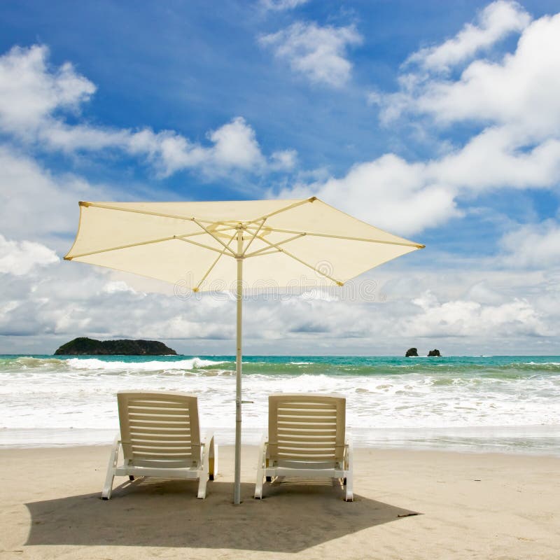 Two Chairs at the Beach stock photo. Image of coastline - 3501638