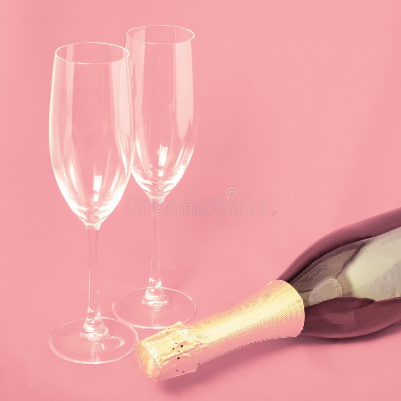 Two Champagne Glasses and Bottle, the Bottle Lies Stock Photo Image