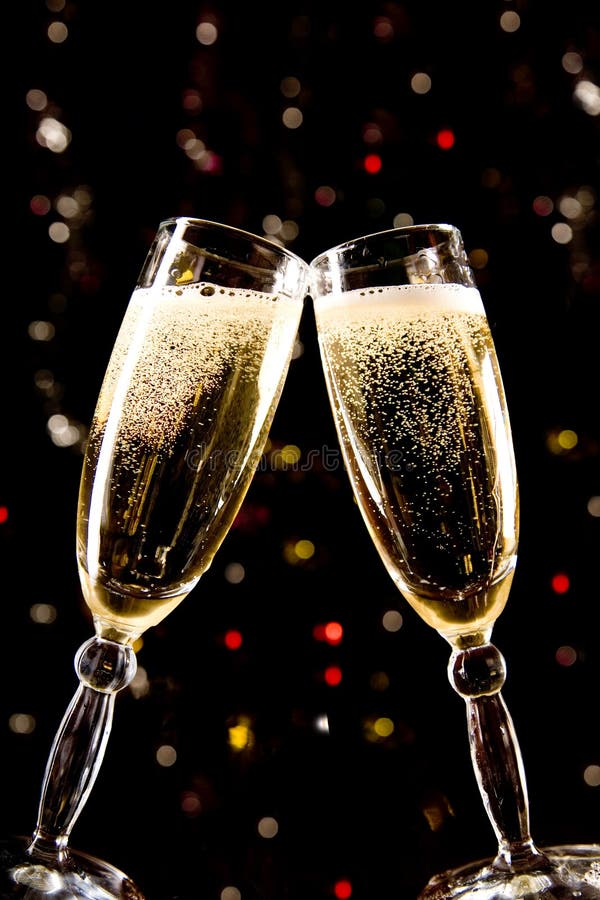 Two champagne glasses making toast stock photo Two champagne glasses making toast stock photo