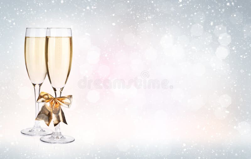 Two champagne glasses over christmas background royalty free stock images Two champagne glasses over christmas background royalty free stock images