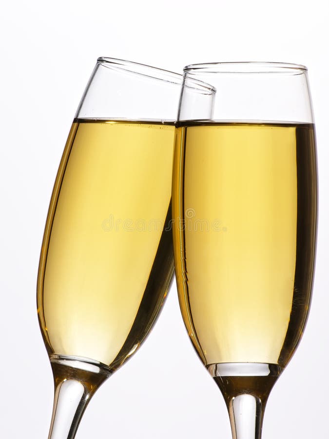 Two champagne glasses in toast