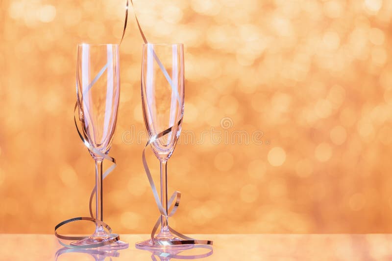 Two Champagne Glasses Wrapped with Ribbon As a Decoration Stock Photo