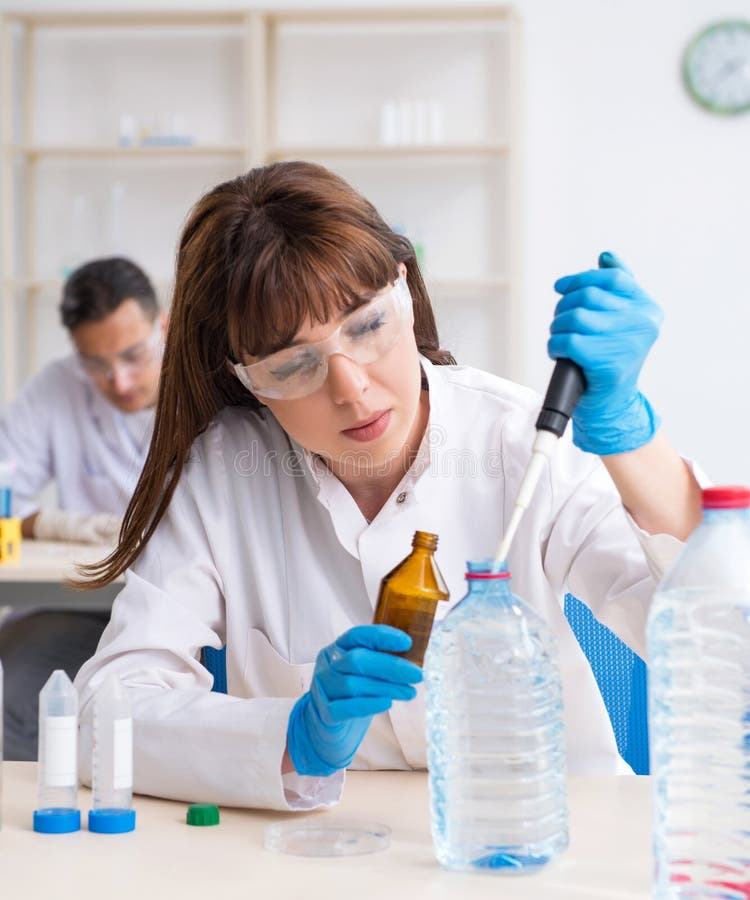 Two Chemists Working in the Lab Stock Photo Image of assistant Two Chemists Working in the Lab Stock Photo Image of assistant