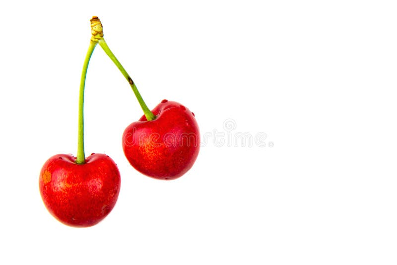 Two cherries on white isolated background.