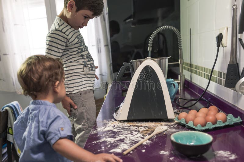 Two Children Baking Cake at Home Stock Image - Image of pretty, baking